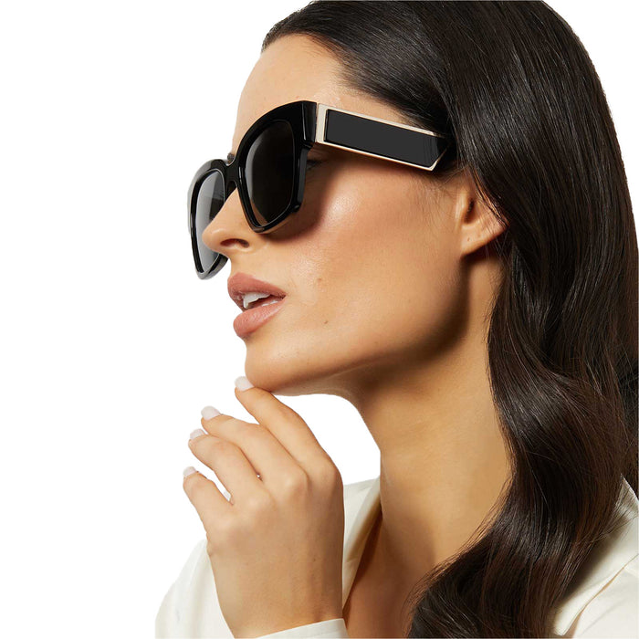 on model - female wearing diff eyewear isabella square sunglasses with a black frame and grey polarized lenses detailed view