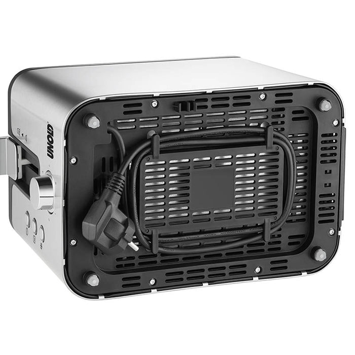 Der Unold Toaster 2 er Kompakt, ein silbernes Kรผchengerรคt, ist verkehrt herum abgebildet, das schwarze Netzkabel ist um eine Halterung an der Unterseite gewickelt. Seitliche Bedienknรถpfe und Tasten sind sichtbar.