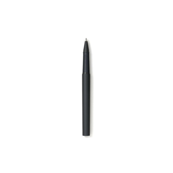 Black ballpoint pen open on a white background