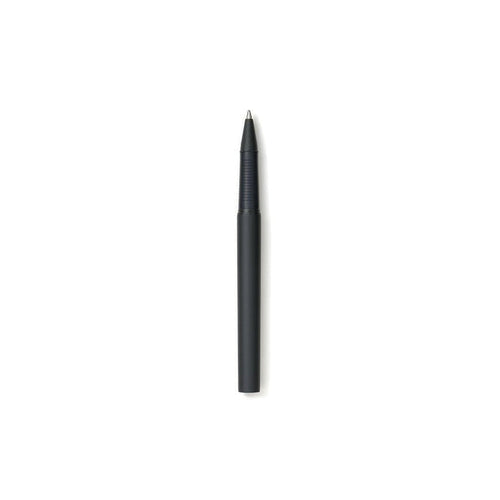 Black ballpoint pen open on a white background