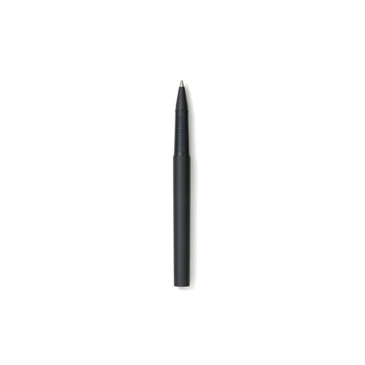 Black ballpoint pen open on a white background
