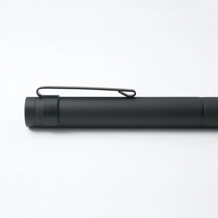 Black pen on a white background