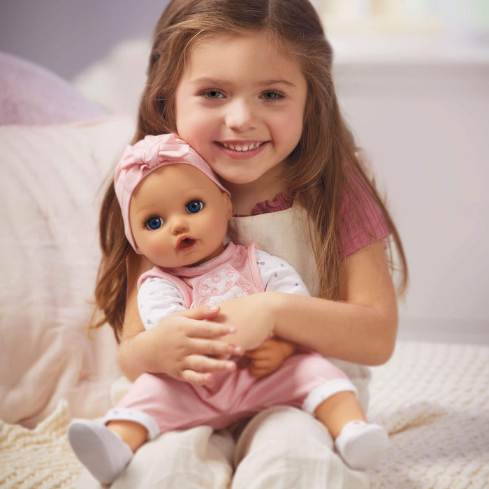 Girl holding Baby Doll  Annabelle