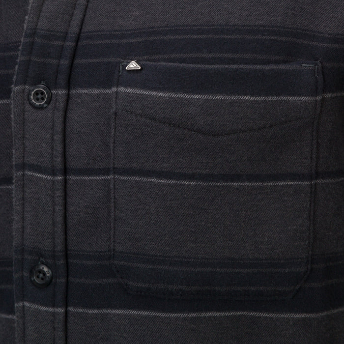 Close-up of the chest pocket on the Bartlett Woven Jacket, featuring soft, durable, beach-inspired apparel fabric.