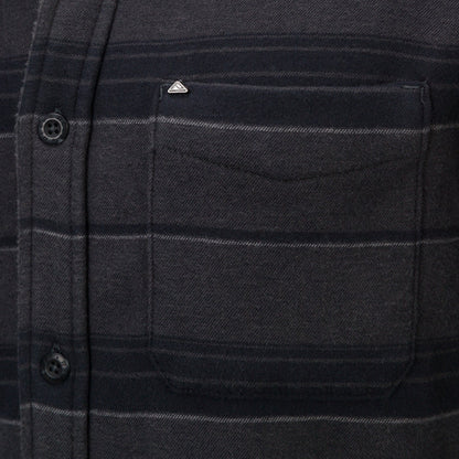 Close-up of the chest pocket on the Bartlett Woven Jacket, featuring soft, durable, beach-inspired apparel fabric.