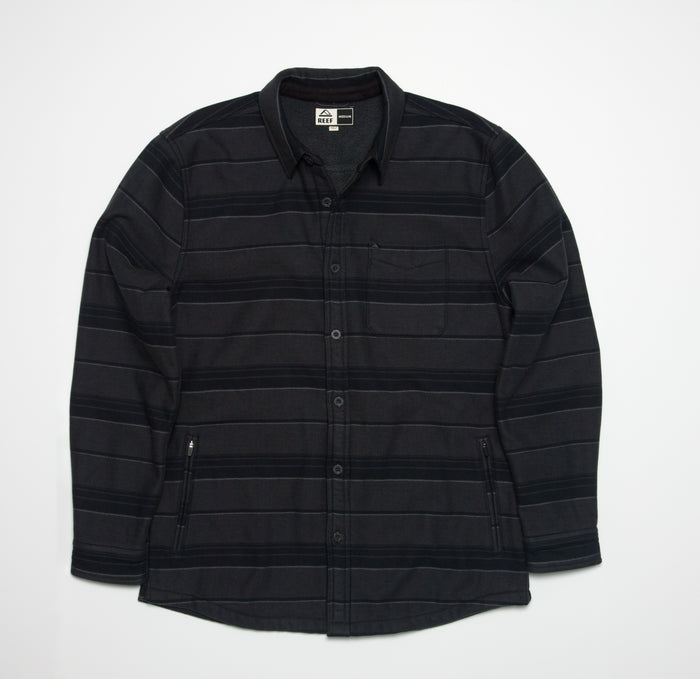 Front view of the Bartlett Woven Jacket in black with subtle stripes, featuring a button-up design and collar.