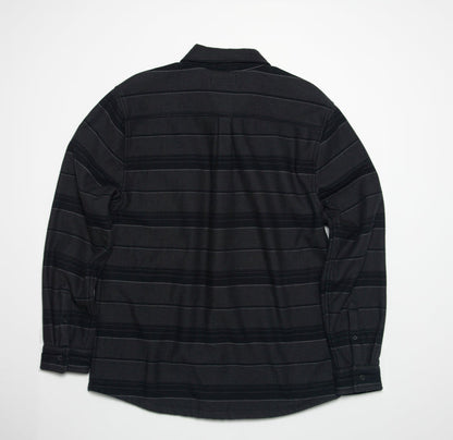 Bartlett Woven Jacket back view showing textured black striped beach-inspired comfort apparel with long sleeves and collar