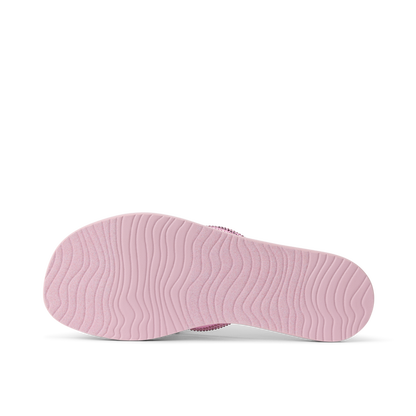 Bliss Bling Fling women's right sandal sole facing up in sunset pink with durable, water-friendly, cushioned design.