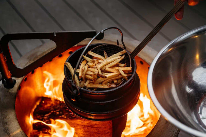 Cooking french fries over the fire