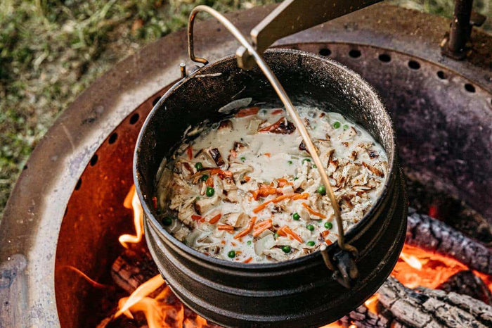 Cooking stew in a Breeo Kettle over the fire