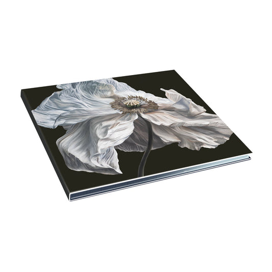 A Quicksand hardcover book with a close-up white poppy on a black background is displayed at an angle on a white surface—ideal for fans anticipating the Bring on The Psychics CD and album release in July 2026.