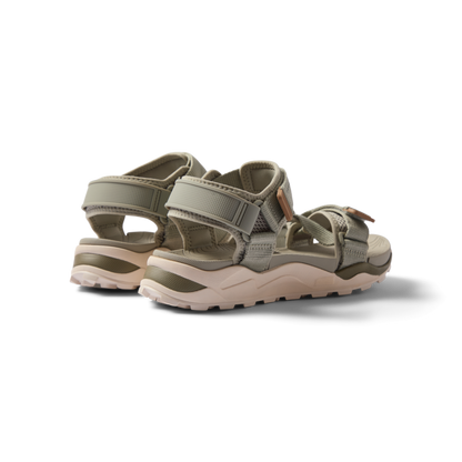 Cross-Shore men's sandals facing backward, showing cushioned heel and surf-inspired durable straps for beach comfort.