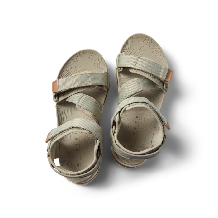 Top view of Cross-Shore men’s sandals in tan with adjustable straps, soft cushioning, and arch support for beach comfort.