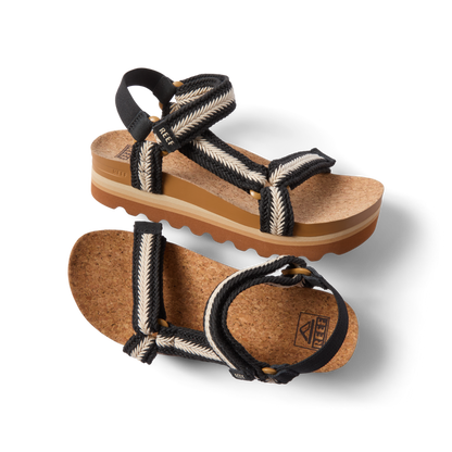 Cushion Rem Hi women's sandals facing right, close-up on straps and cushioned platform with arch support, beach-inspired comfort.