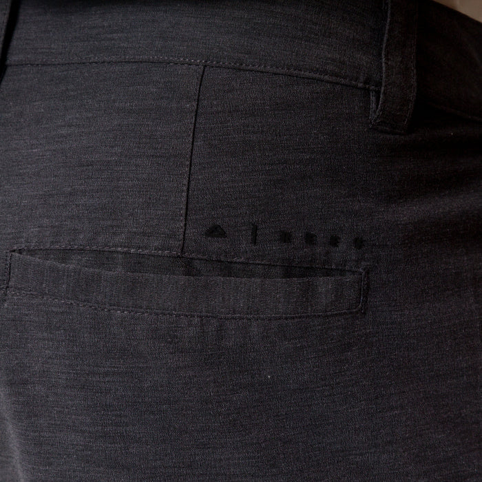 Close-up of the back right pocket of the black Destro Hybrid Short for men, showcasing breathable, comfortable beach apparel.
