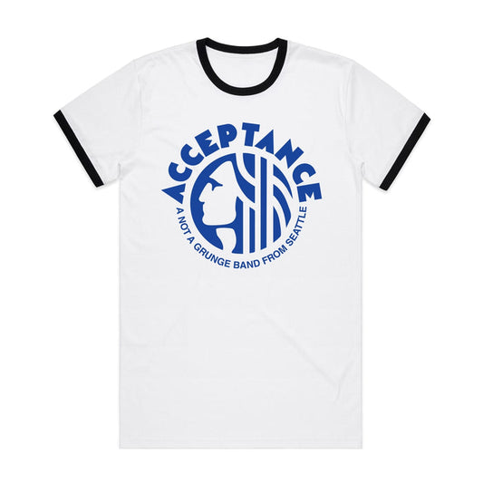 White ringer T-shirt by Acceptance with black collar and sleeves. Features a blue Seattle coffee logo parody on the front, reading “ACCEPTANCE” above and “A NOT GRUNGE BAND FROM SEATTLE” below a stylized Face White design.
