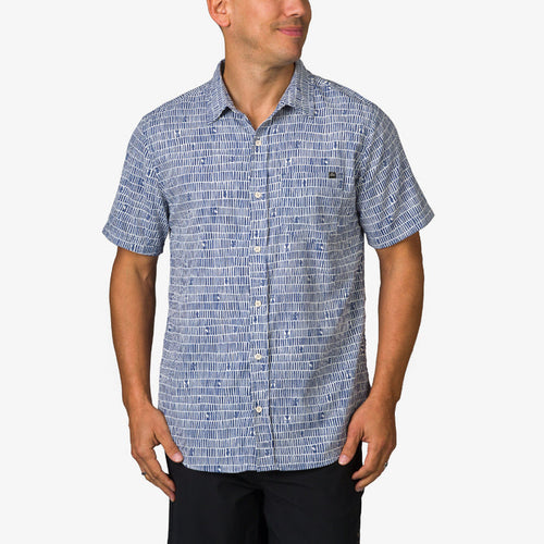 Man wearing a blue patterned Ferris Classic Shirt facing forward, showcasing the short sleeves and button-down front.