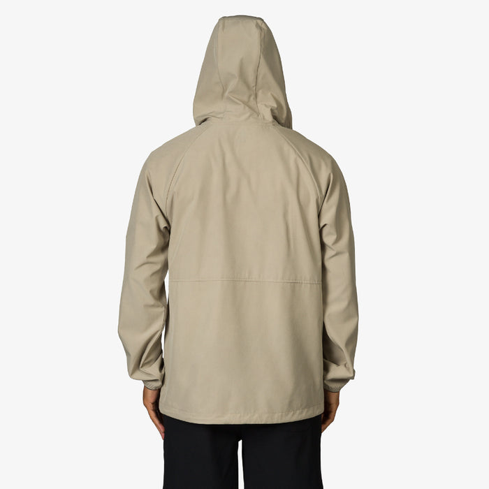 Back view of men’s Garvey Jacket in neutral beige with hood, surf-inspired comfort and durable beach-ready design.