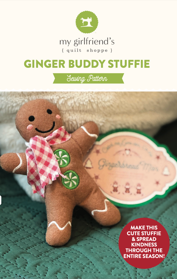 Gingerbread-themed stuffie with a sewing pattern label on a textured surface