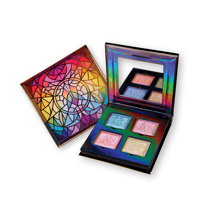 Glow Quad propped open displaying the four shadows with artistic packaging on a white background.