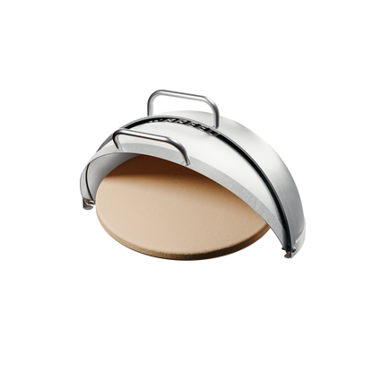 Breeo stainless steel pizza oven dome with ceramic pizza stone, designed for live-fire cooking on Breeo fire pits