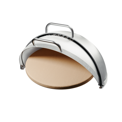 Studio image of the Breeo Dome Pizza Oven attachment for X24 fire pits, shown open to display the round ceramic pizza stone inside. The stainless steel dome includes a built-in temperature gauge and two handles for easy lifting.