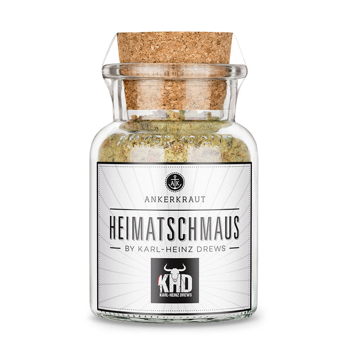 Heimatschmaus von Ankerkraut im Korkenglas auf weißem Hintergrund.