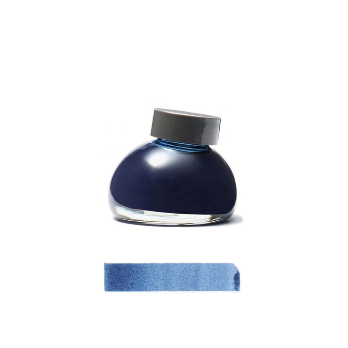 Blue Toppuri ink bottle with a gray cap on a white background