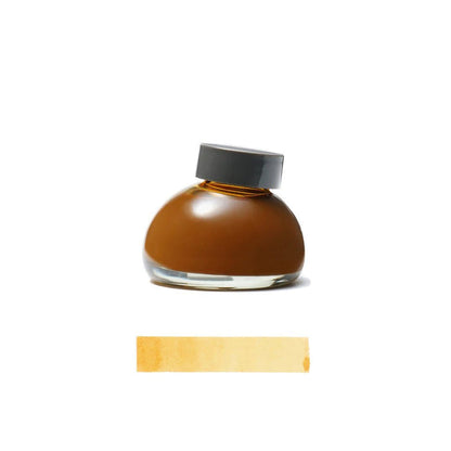 Brown Torori ink bottle with a gray cap on a white background