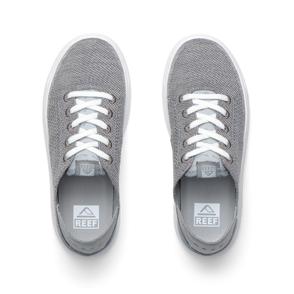 Top view of grey Kids Neptune sneakers with breathable knit upper, white laces, and lightweight cushioned sole facing forward