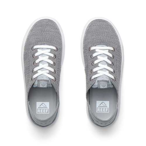 Top view of grey Kids Neptune sneakers with breathable knit upper, white laces, and lightweight cushioned sole facing forward