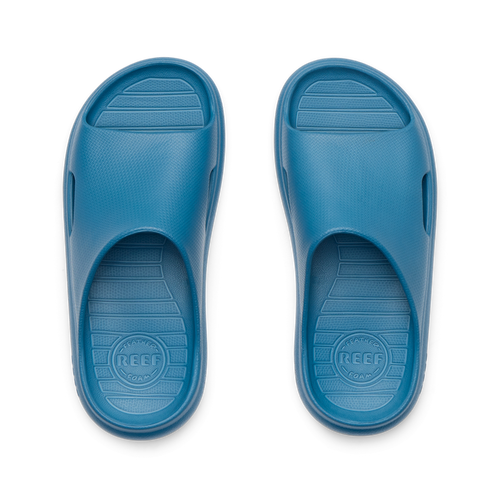 Top-down view of blue Kids Rio Slide facing upward, showing soft-rebound cushioning and anatomical arch support.