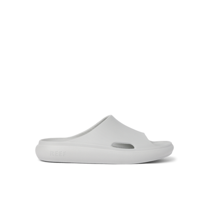 Kids Rio Slide in light grey facing right, close-up side view showcasing lightweight, water-friendly, cushioned slide for kids.