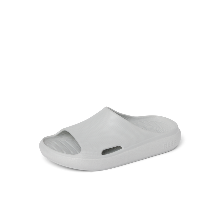 Kids Rio Slide in light grey facing right, close-up of top and outer side showing water-friendly, cushioned, arch-support design.