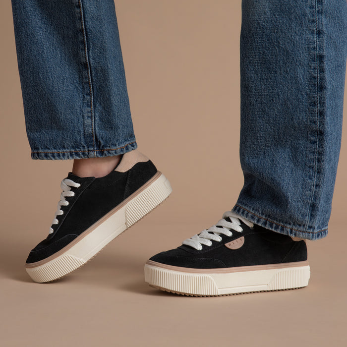 Lay Day Lift women's black platform sneakers facing right and left, surf-inspired comfort with arch support.