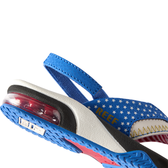 Little Fanning boys' sandal facing left, close-up of heel with air cushion and blue star-patterned strap