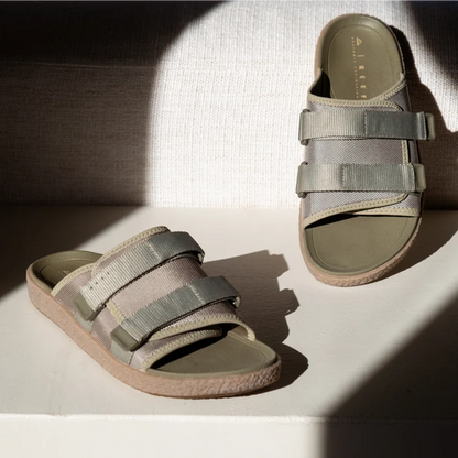 Montauk sandals in sage facing right and left, showing straps and cushioned arch support, surf-inspired comfort design.