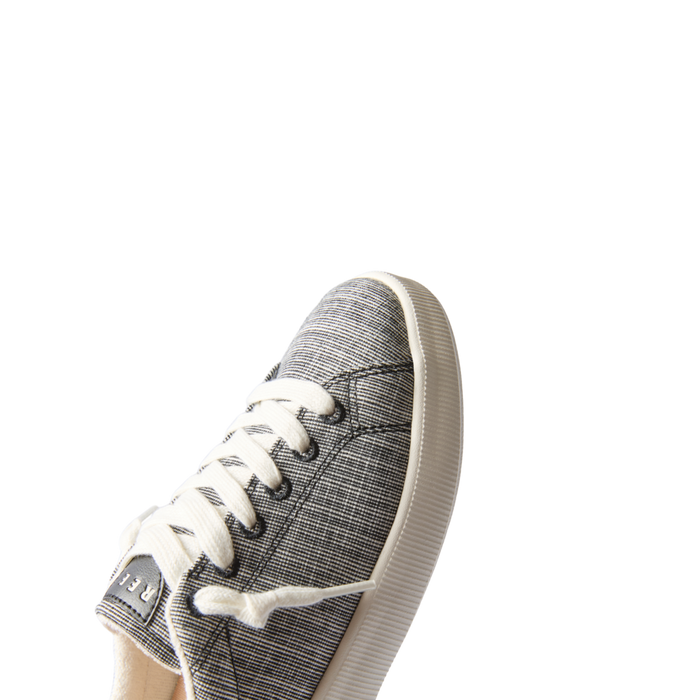 Neptune Alana women’s sneaker facing left, close-up of front and laces, surf-inspired comfort and durable design.