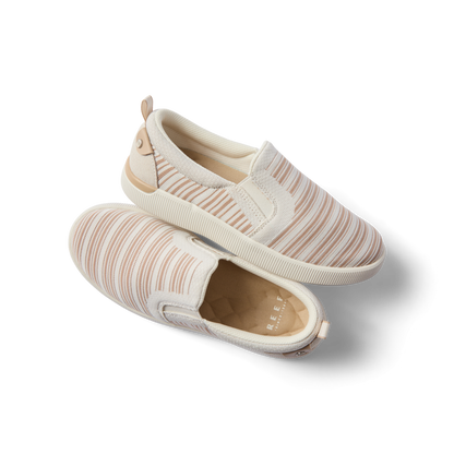 Pair of Neptune Elyse women's slip-on shoes with tan stripe pattern, right shoe facing right, top shoe showing outsole, comfort-focused design.