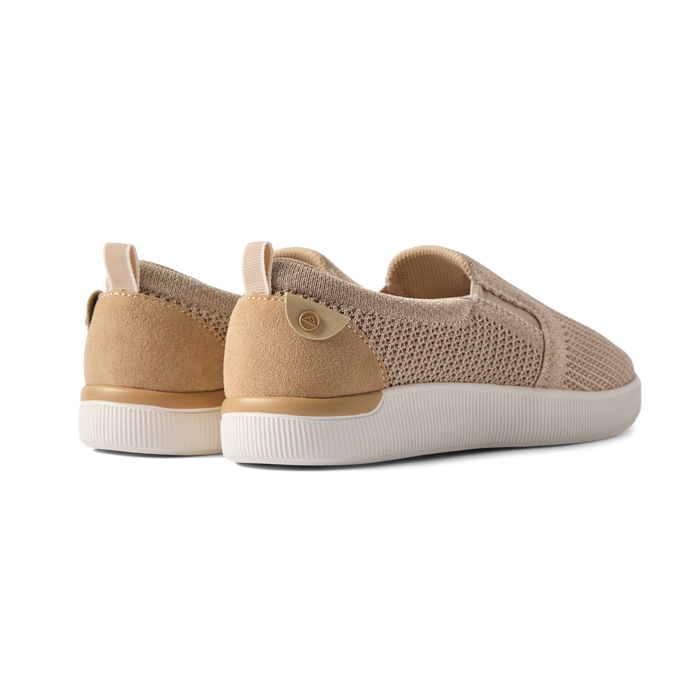 Neptune Elyse women’s slip-on shoes facing backward, showcasing heel and knit upper, beach-inspired comfort design.