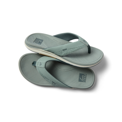 Offshore men's flip flops facing left, soft-rebound cushioning, anatomical arch support, beach-inspired comfort sandals.