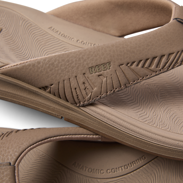 Close-up of the tan Offshore sandal strap and footbed facing left, highlighting anatomical arch support and cushioning.