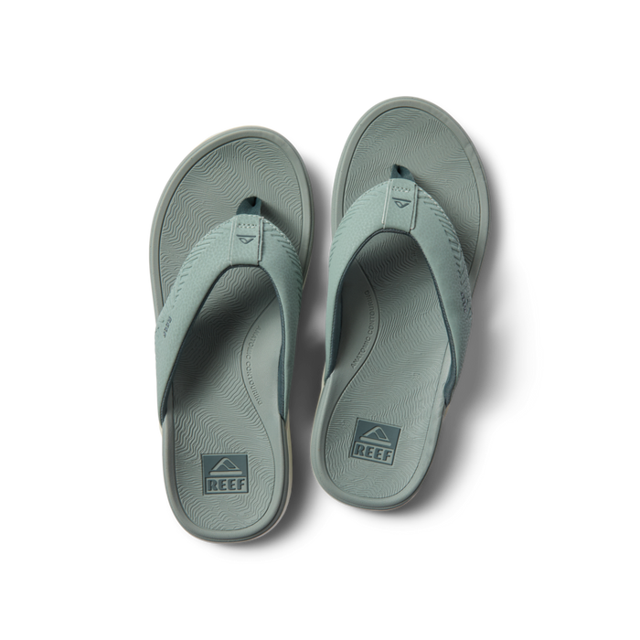 Top view of Offshore men's flip flop sandals in muted green with soft-rebound cushioning and arch support by REEF.