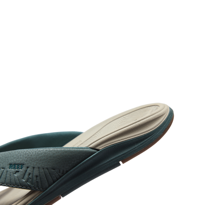 Offshore men's sandal facing right, showing the side and footbed with anatomical arch support and soft cushioning.
