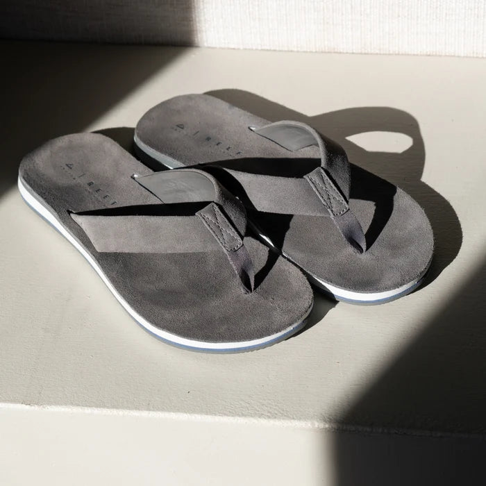 Ojai Classic men's grey flip flops facing upward showing top straps and soft-rebound cushioned footbed for comfort.