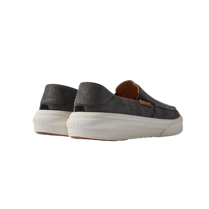 Pacific men's black slip-on shoes viewed from the back, showcasing lightweight, cushioned soles for beach comfort.