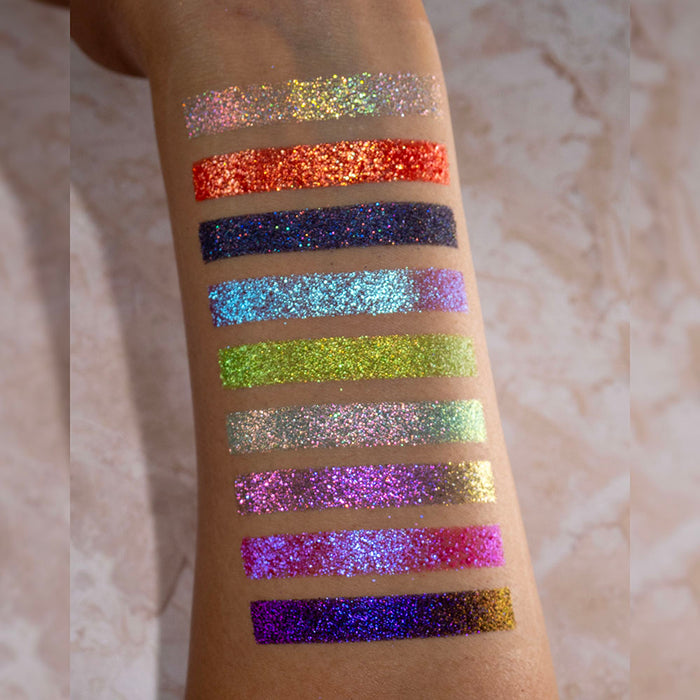Swatches of all nine Pick Your Potion eyeshadows on medium coloured skin.
