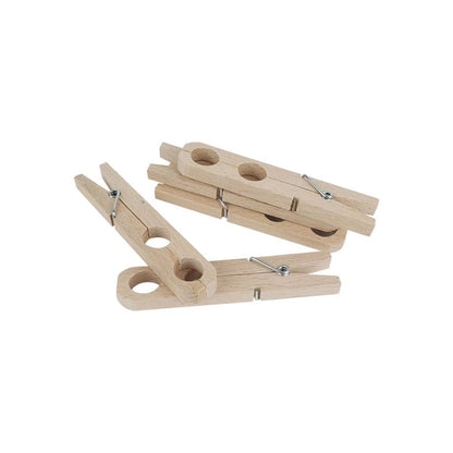 Set of wooden plant clamps on white background