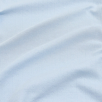 Close up of the light blue pointelle fabric