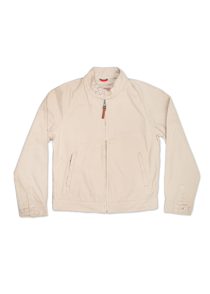 Beige jacket with a high collar, button details, and front pockets, displayed on a black background, showcasing casual style.
